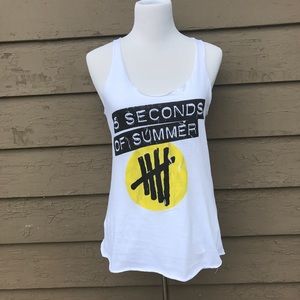 A white tank top  the band five seconds of summer